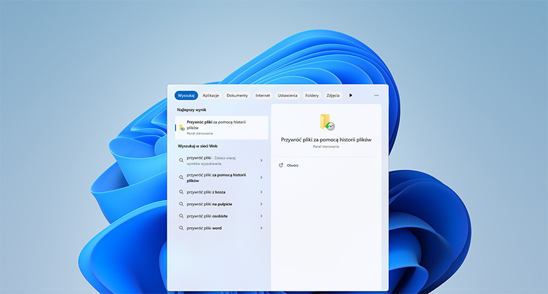 Okno wyszukiwania systemu Windows 11 z opcją przywracanie plików za pomocą historii